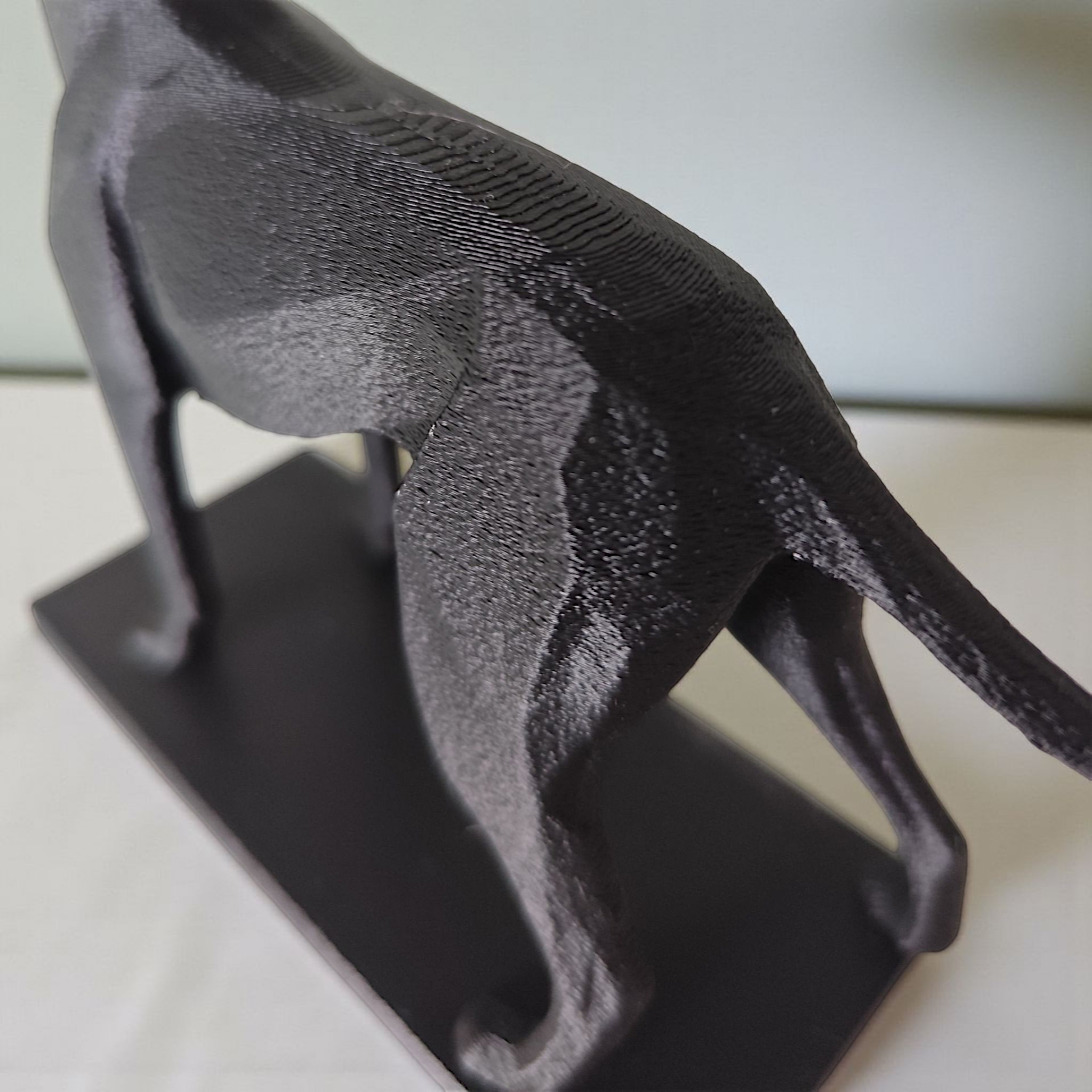 Minimalist hunting dog sculpture - front view